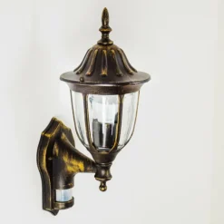 Luminaires Rustiques-hofstein Applique murale d'extérieur Ribadeo Noir doré, 1 lumière, Détecteur de mouvement