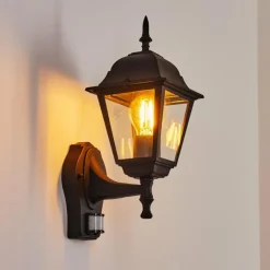 Luminaires Rustiques-hofstein Applique murale d'extérieur Naofe Noir, 1 lumière, Détecteur de mouvement