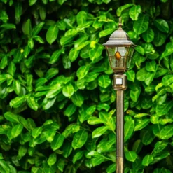 Luminaires Rustiques-hofstein Borne lumineuse Antibes Brun doré, 1 lumière, Détecteur de mouvement