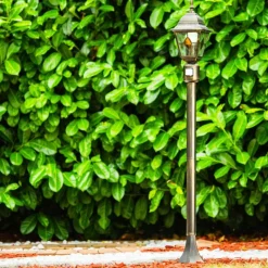 Luminaires Rustiques-hofstein Borne lumineuse Antibes Brun doré, 1 lumière, Détecteur de mouvement