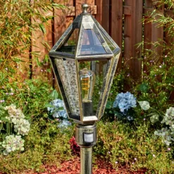 Luminaires Rustiques-hofstein Falfosa Luminaire extérieur, Eclairage de chemin Or, Noir, 1 lumière, Détecteur de mouvement