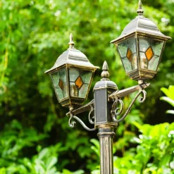 Luminaires Rustiques-hofstein Réverbère Antibes Brun doré, 2 lumières