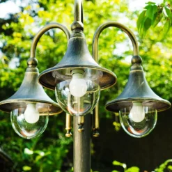 Luminaires Rustiques-hofstein Réverbère Elgin Brun doré, 3 lumières