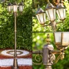 Luminaires Rustiques-hofstein Réverbère Hongkong Frost Brun doré, 3 lumières