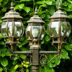 Luminaires Rustiques-hofstein Réverbère Kobe Brun doré, 3 lumières