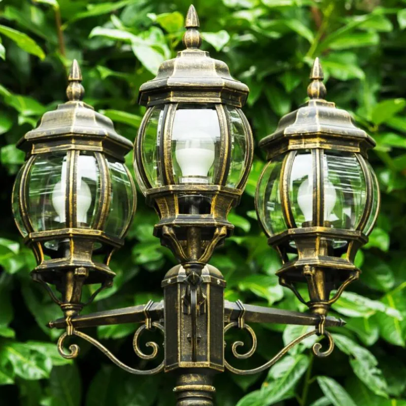 Luminaires Rustiques-hofstein Réverbère Kobe Brun doré, 3 lumières