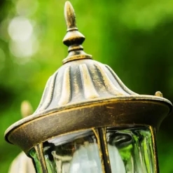 Luminaires Rustiques-hofstein Réverbère Ribadeo Noir doré, 3 lumières